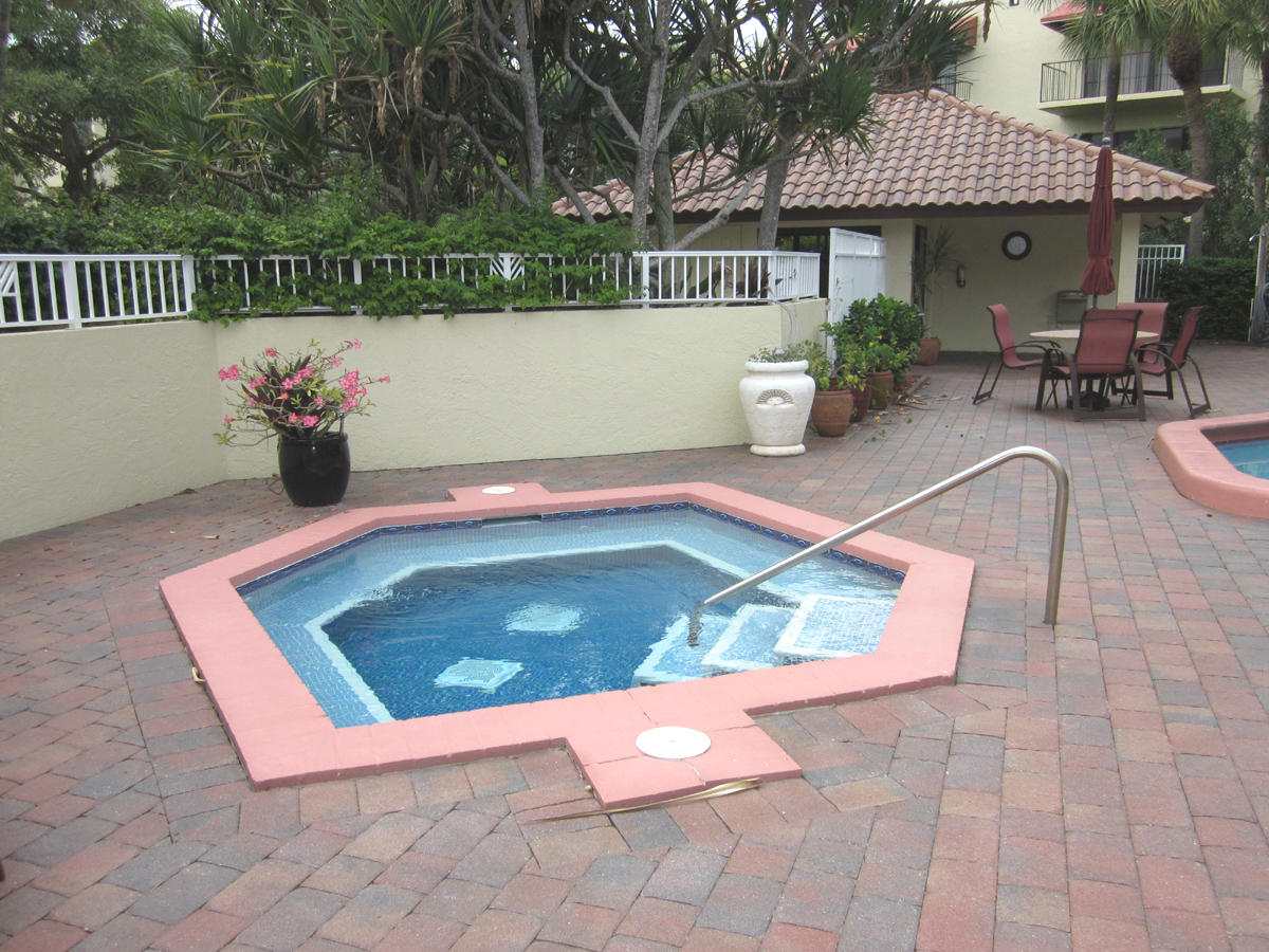 170 Celestial Way, Unit 46 Juno Beach, FL 33408 - Photo 32 of 33 a view of a house with a yard