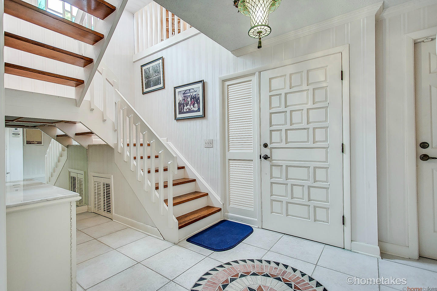 170 Celestial Way, Unit 46 Juno Beach, FL 33408 - Photo 5 of 33 a view of entryway with hall and stairs