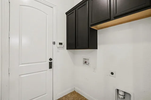 a bathroom with a shower and a sink
