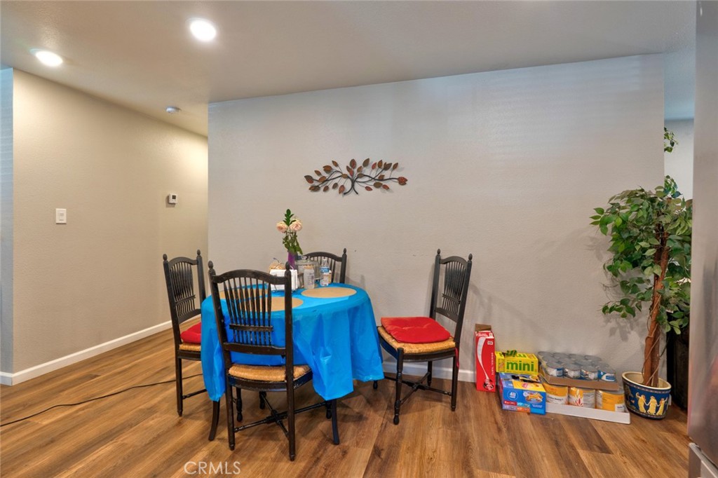 1840 Cheyenne Drive Merced, CA 95348 - Photo 25 of 90 a view of a dining room with furniture and wooden floor