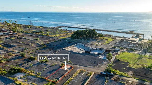 a view of a field with an ocean