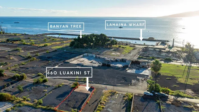 a view of a street with an outdoor seating
