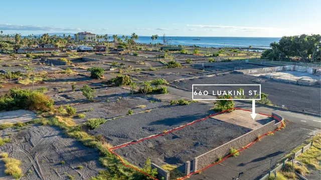 a view of a city with an ocean