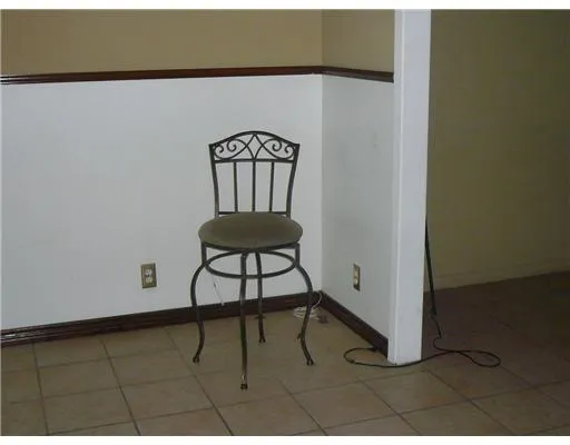 a view of a livingroom with furniture and wooden floor