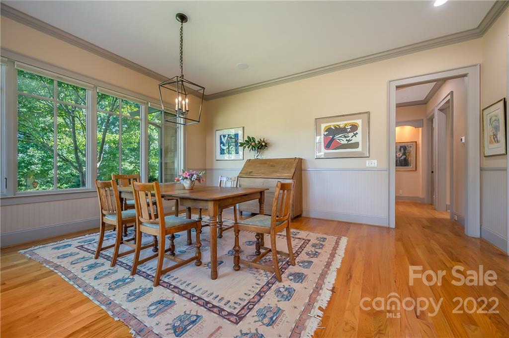 1360 South Phillips Road Columbus, NC 28722 - Photo 20 of 41 a dining room with furniture window wooden floor