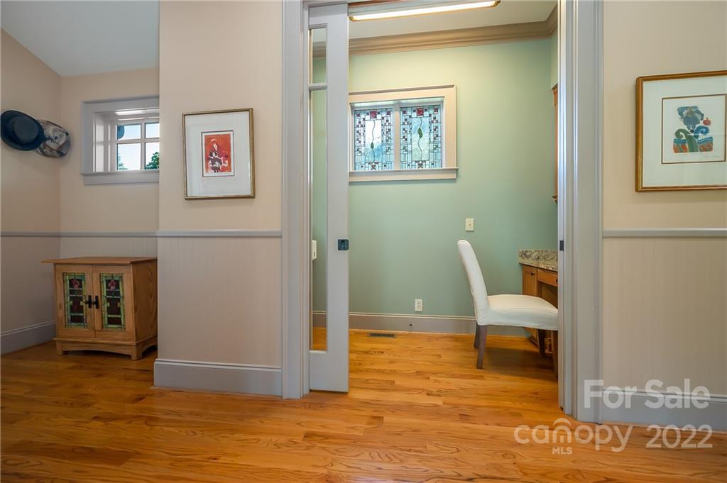 1360 South Phillips Road Columbus, NC 28722 - Photo 23 of 41 a view of a livingroom with wooden floor and furniture