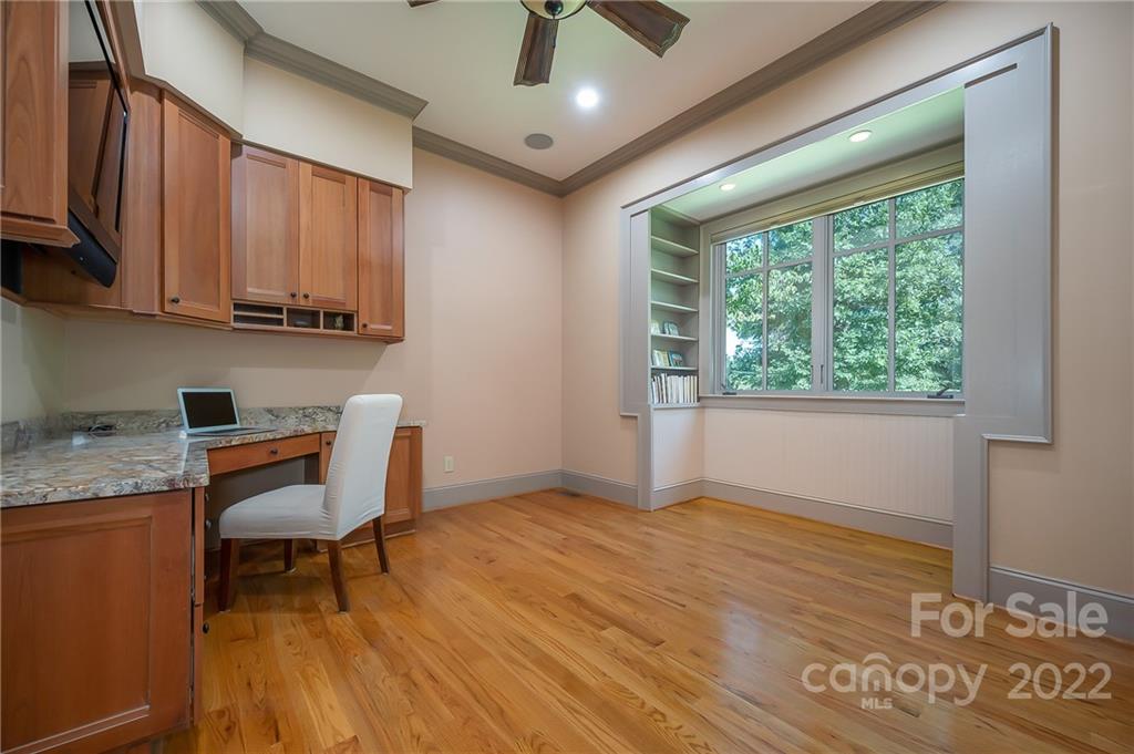 1360 South Phillips Road Columbus, NC 28722 - Photo 27 of 41 a workspace with wooden floor and a window