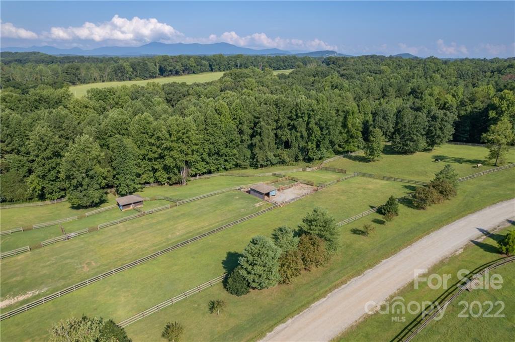 1360 South Phillips Road Columbus, NC 28722 - Photo 3 of 41 a view of a big yard with green space