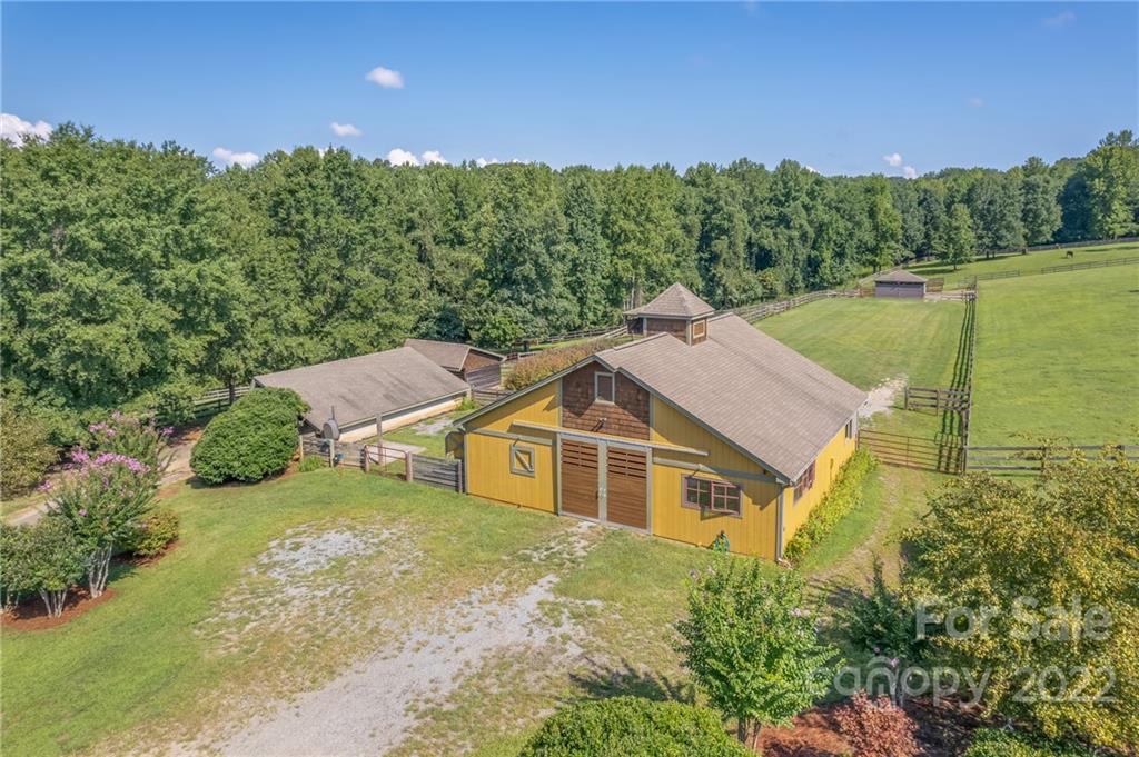 1360 South Phillips Road Columbus, NC 28722 - Photo 38 of 41 an aerial view of a house with a yard