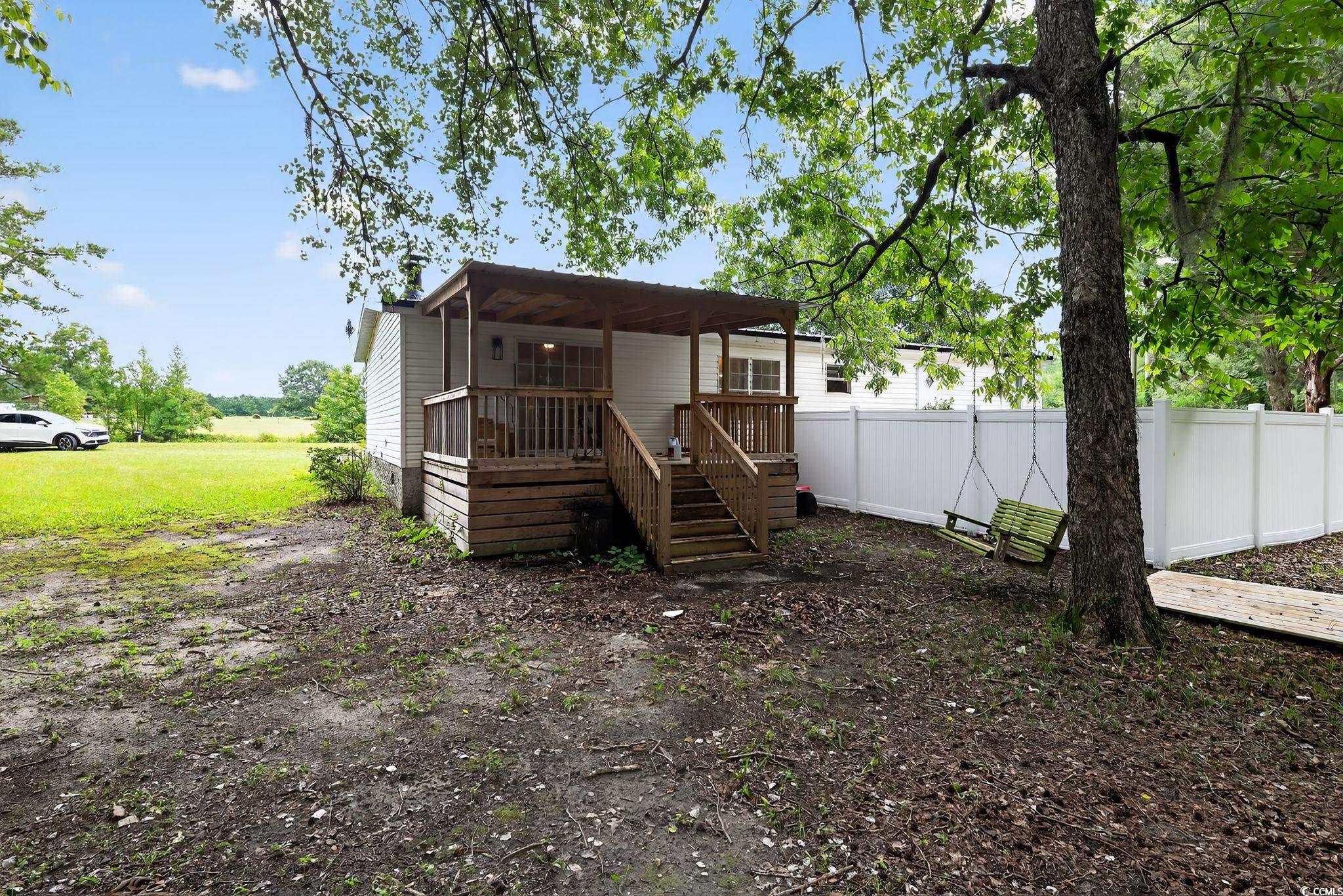 937 Farmers Road Elloree, SC 29047 - Photo 5 of 20 Back of house featuring a deck