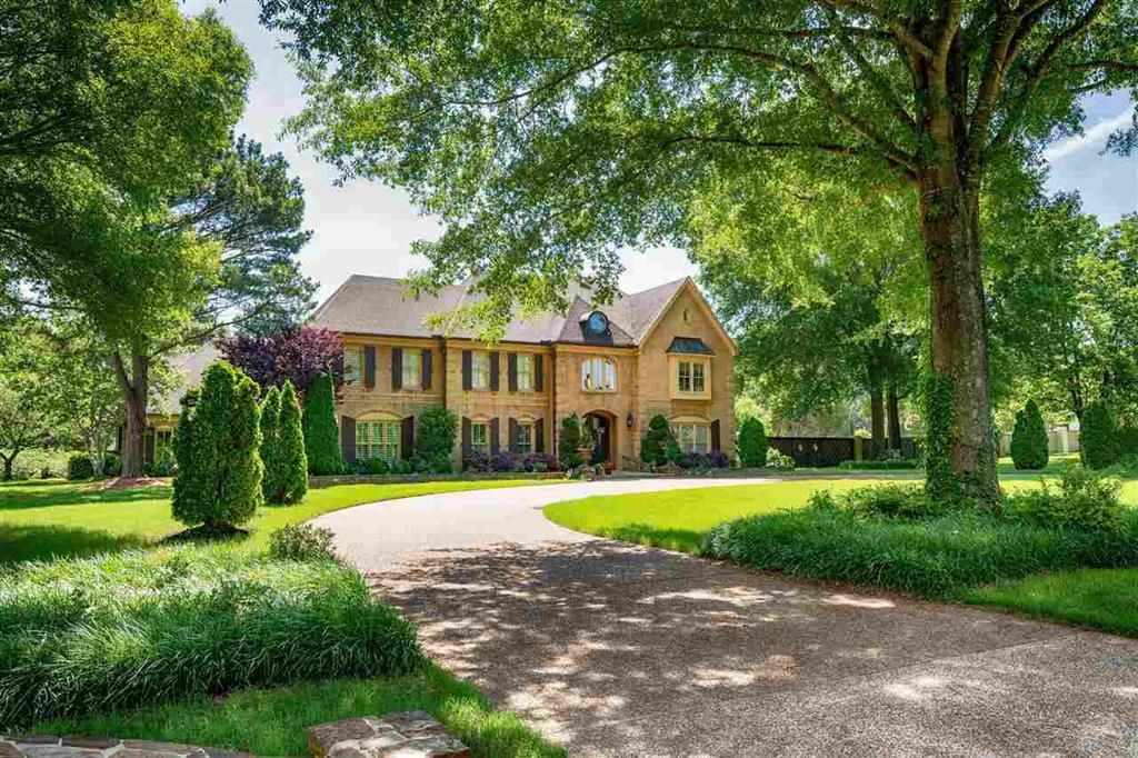 2420 Johnson Road Germantown, TN 38139 - Photo 1 of 25 This picture is from Summer 2019. We are including this picture from previous listing (with past owner's permission) so that you can see how beautiful the yard is during the green grass months.