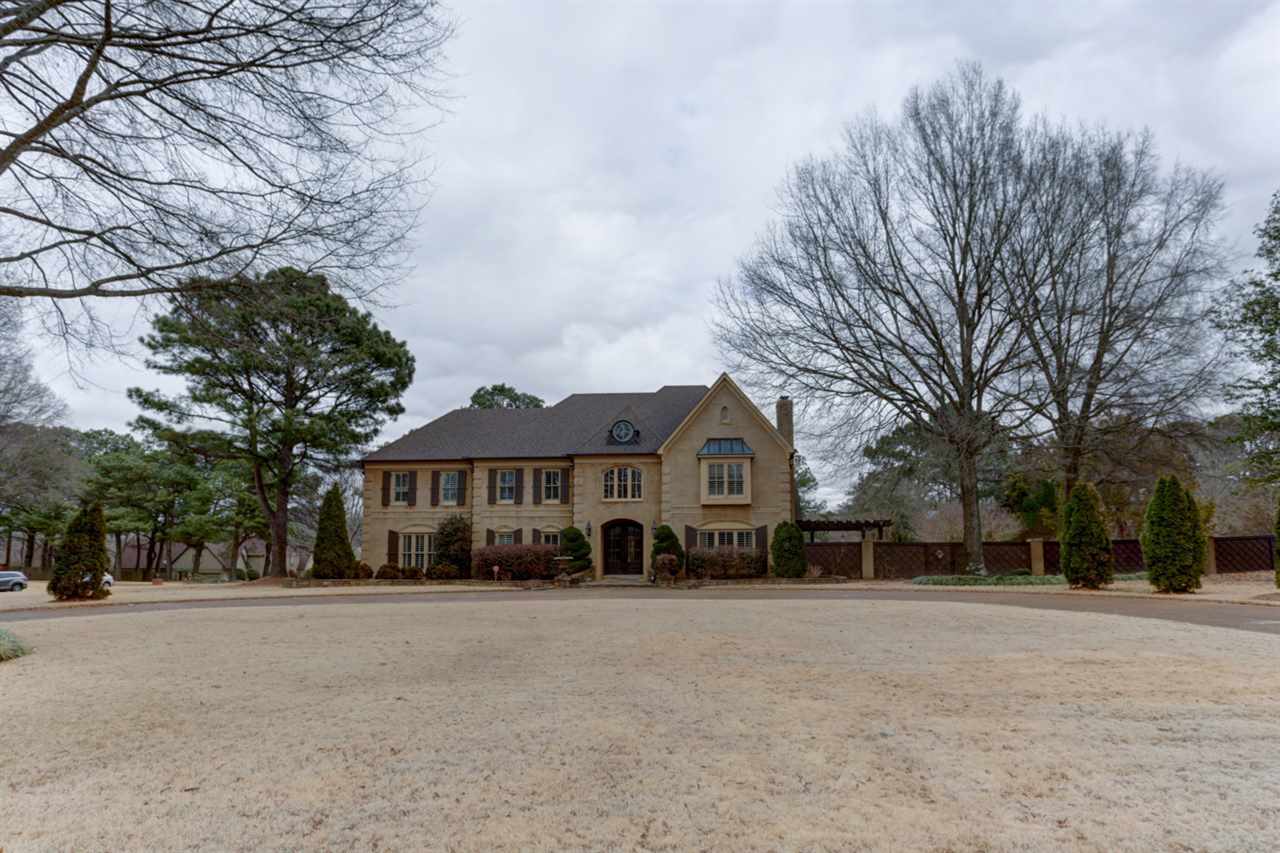 2420 Johnson Road Germantown, TN 38139 - Photo 3 of 25 This home sits on a 2 acre lot. What a stately look as you drive around the circular drive.