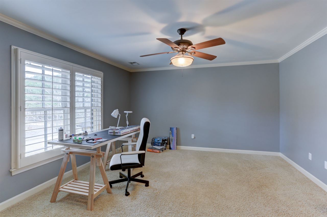 2420 Johnson Road Germantown, TN 38139 - Photo 23 of 25 This bedroom shares a bathroom with bedroom 4. Room is currently being used as a hobby room.