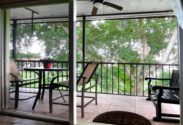 a view of swimming pool with a patio