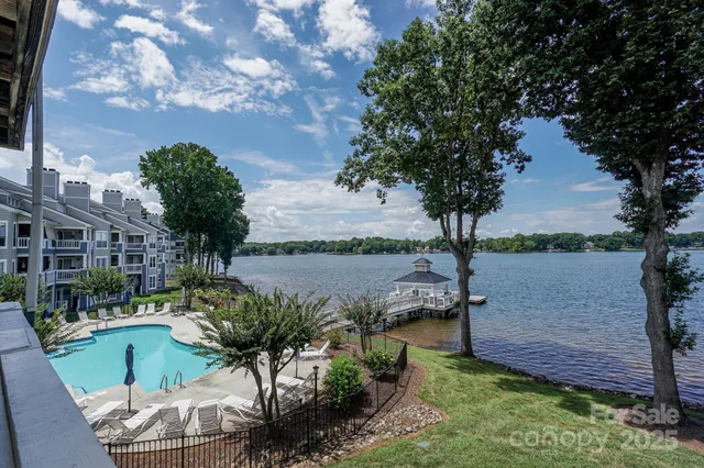 a view of a lake with a yard