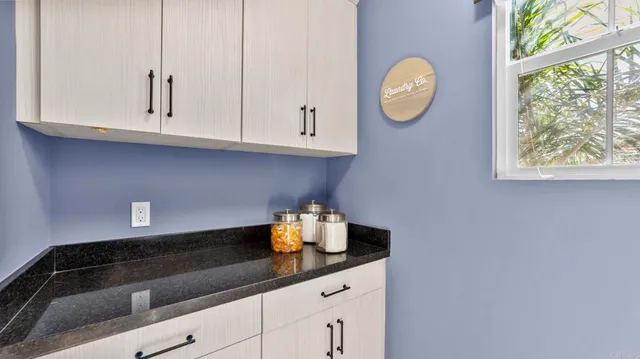 a bathroom with a sink and a vanity