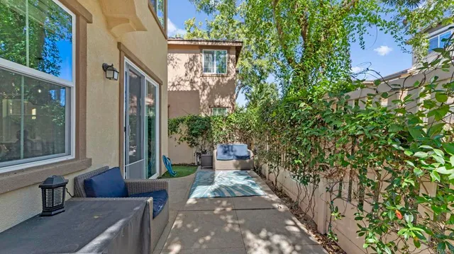 a view of a back yard of the house