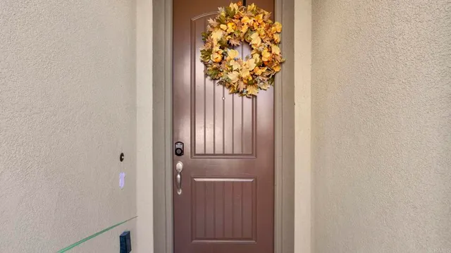 a living room with furniture and a gate