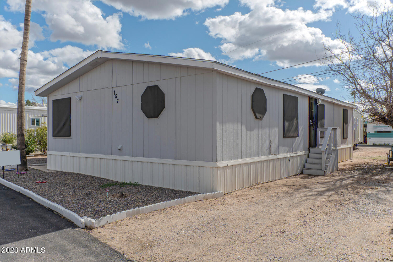 16005 North 32nd Street, Unit 157 Phoenix, AZ 85032 - Photo 25 of 37 East Side of Home
