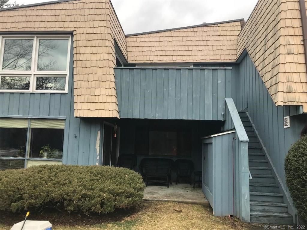 1223 Stratfield Road, Unit 1223 Fairfield, CT 06825 - Photo 3 of 13 Covered Patio, accessed by Sliders off of Living Room. Steps away from pool.