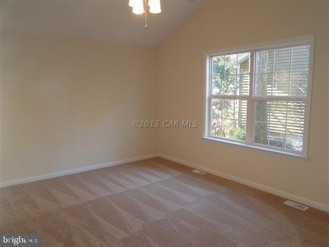240 Windjammer Road Berlin, MD 21811 - Photo 7 of 22 an empty room with a window
