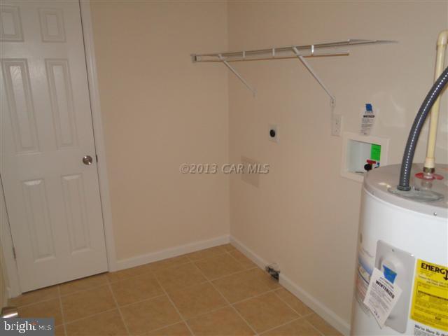 240 Windjammer Road Berlin, MD 21811 - Photo 8 of 22 a view of storage and utility room with a sink