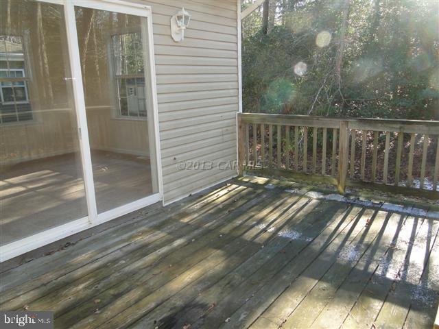 240 Windjammer Road Berlin, MD 21811 - Photo 9 of 22 a view of backyard with small cabin