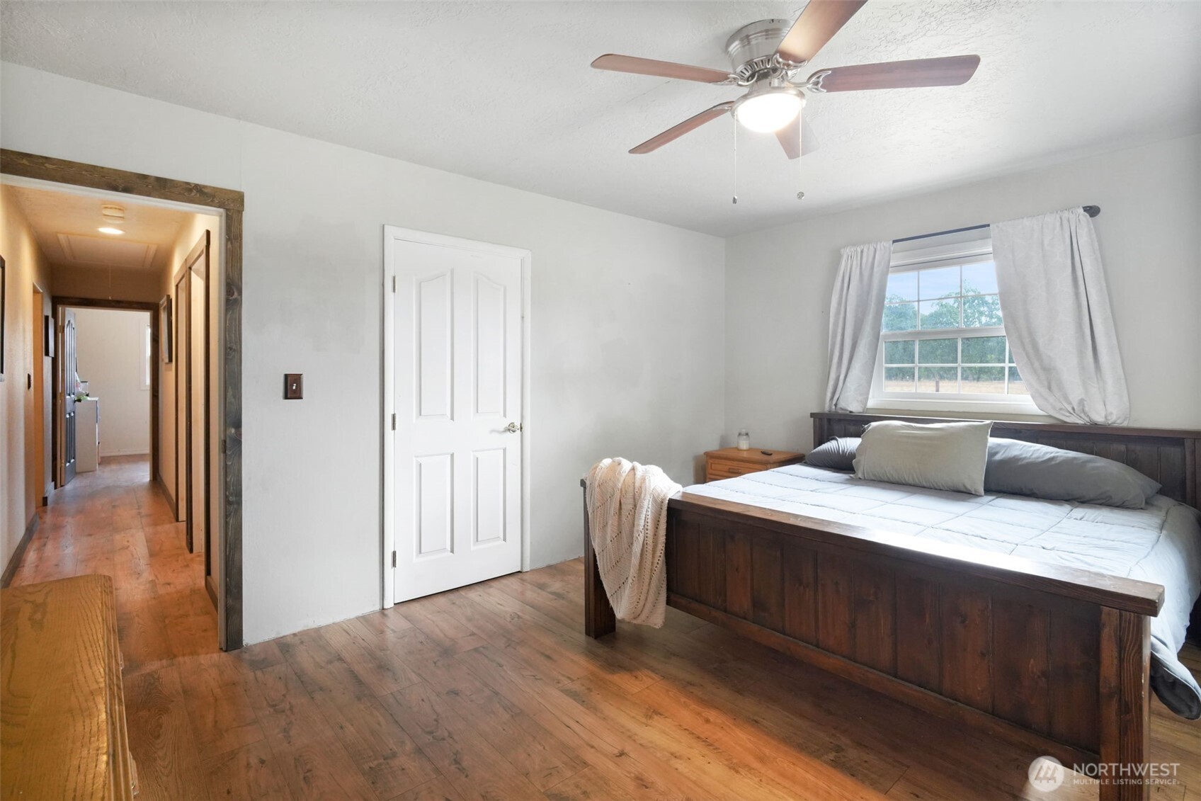 142 Drews Prairie Road Toledo, WA 98591 - Photo 15 of 33 a bedroom with a bed and a ceiling fan