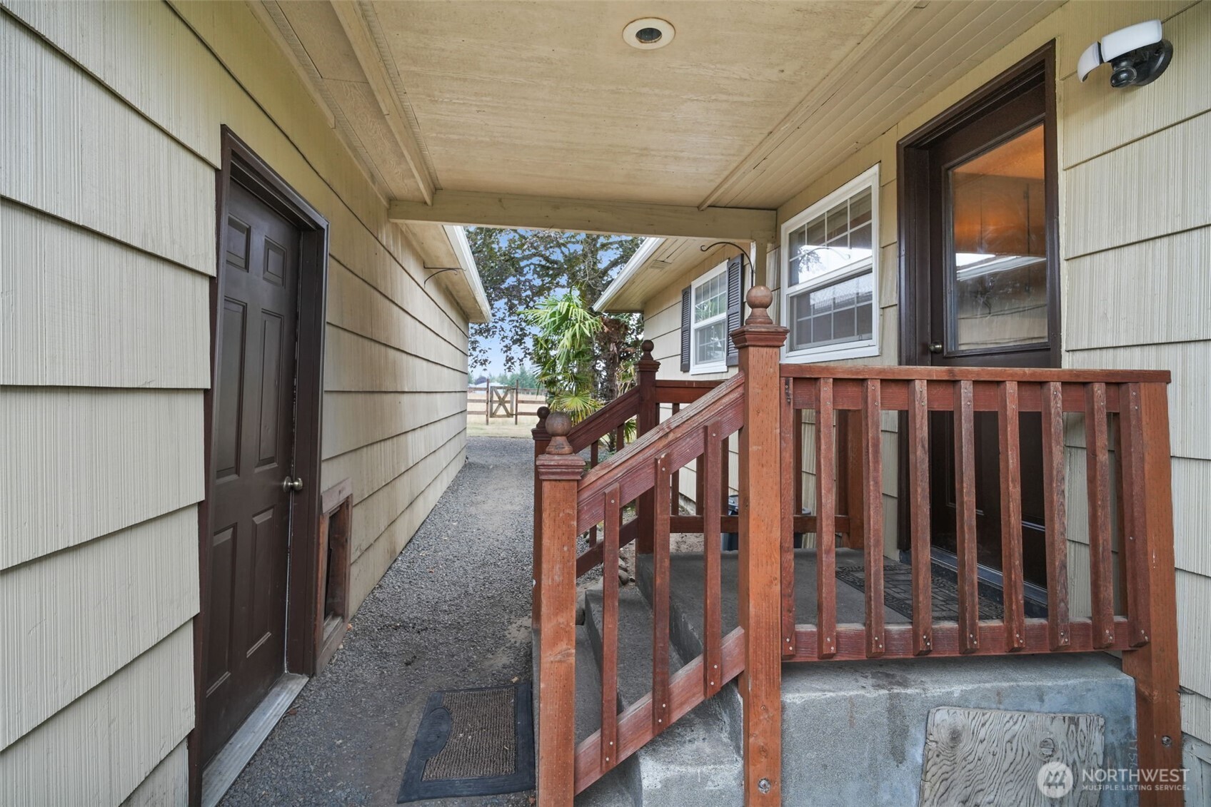 142 Drews Prairie Road Toledo, WA 98591 - Photo 20 of 33 a view of a porch with wooden floor