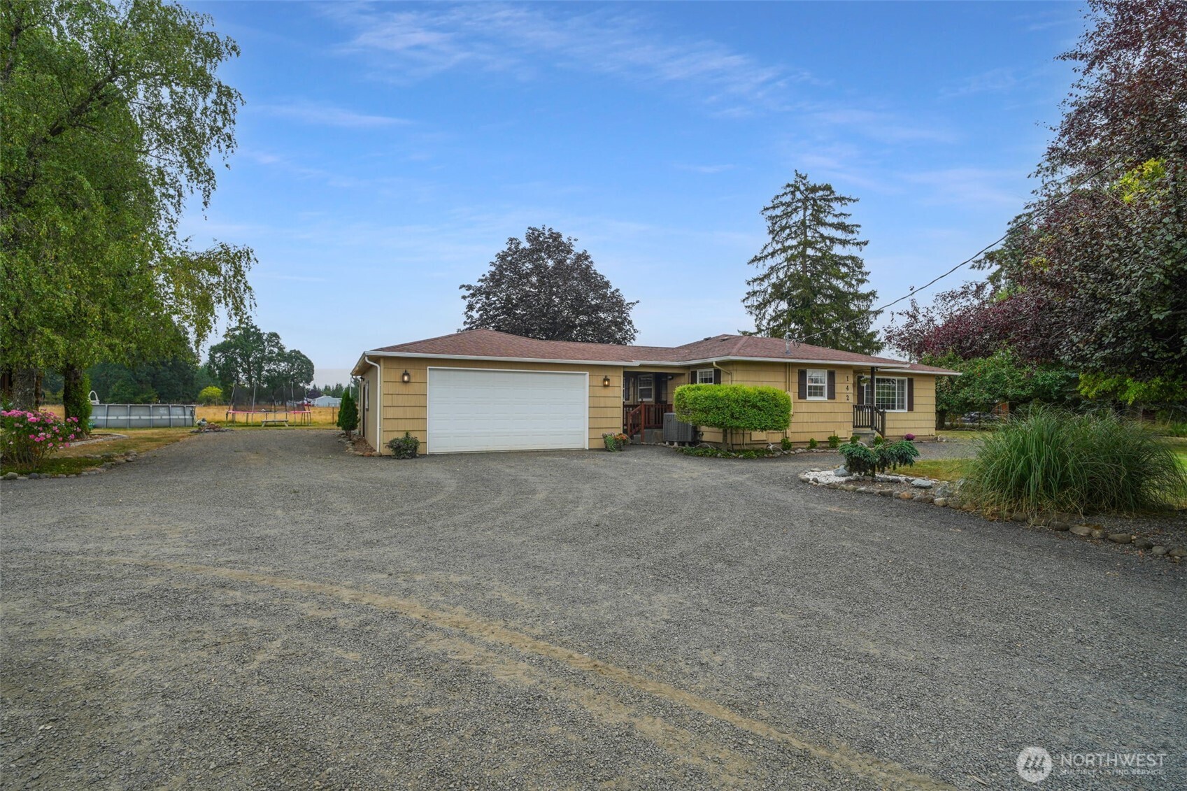 142 Drews Prairie Road Toledo, WA 98591 - Photo 2 of 33 a view of a house with a yard and garage