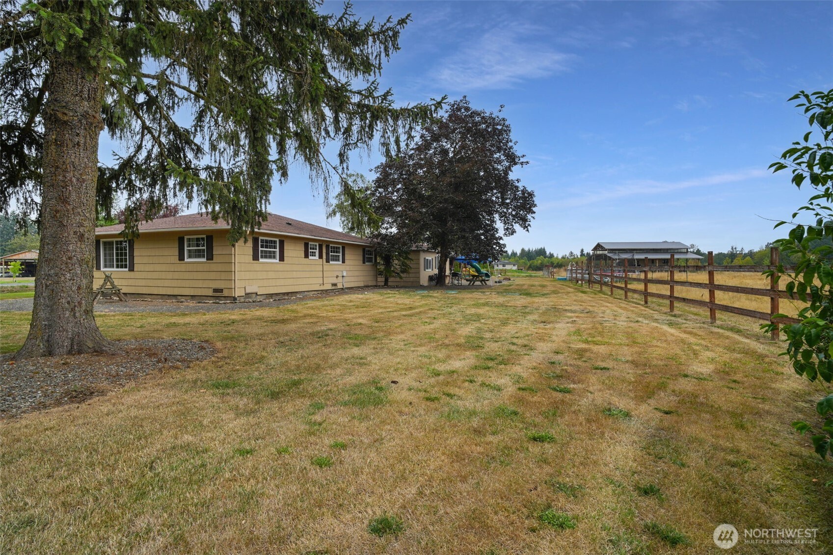 142 Drews Prairie Road Toledo, WA 98591 - Photo 23 of 33 a front view of a house with a garden