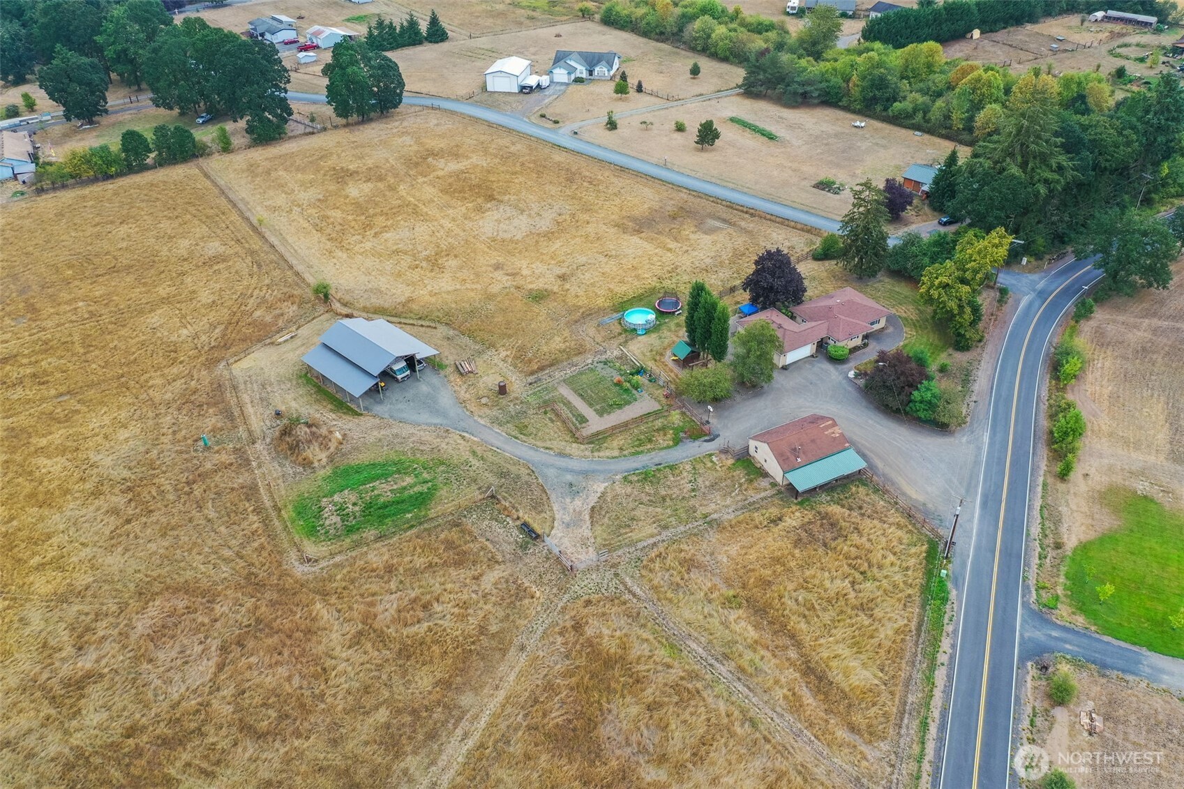 142 Drews Prairie Road Toledo, WA 98591 - Photo 31 of 33 an aerial view of a house with a yard and trees