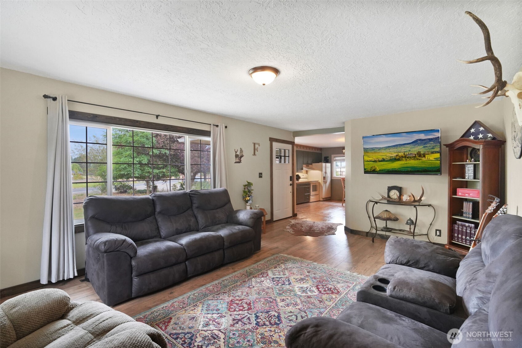 142 Drews Prairie Road Toledo, WA 98591 - Photo 4 of 33 a living room with furniture and a large window