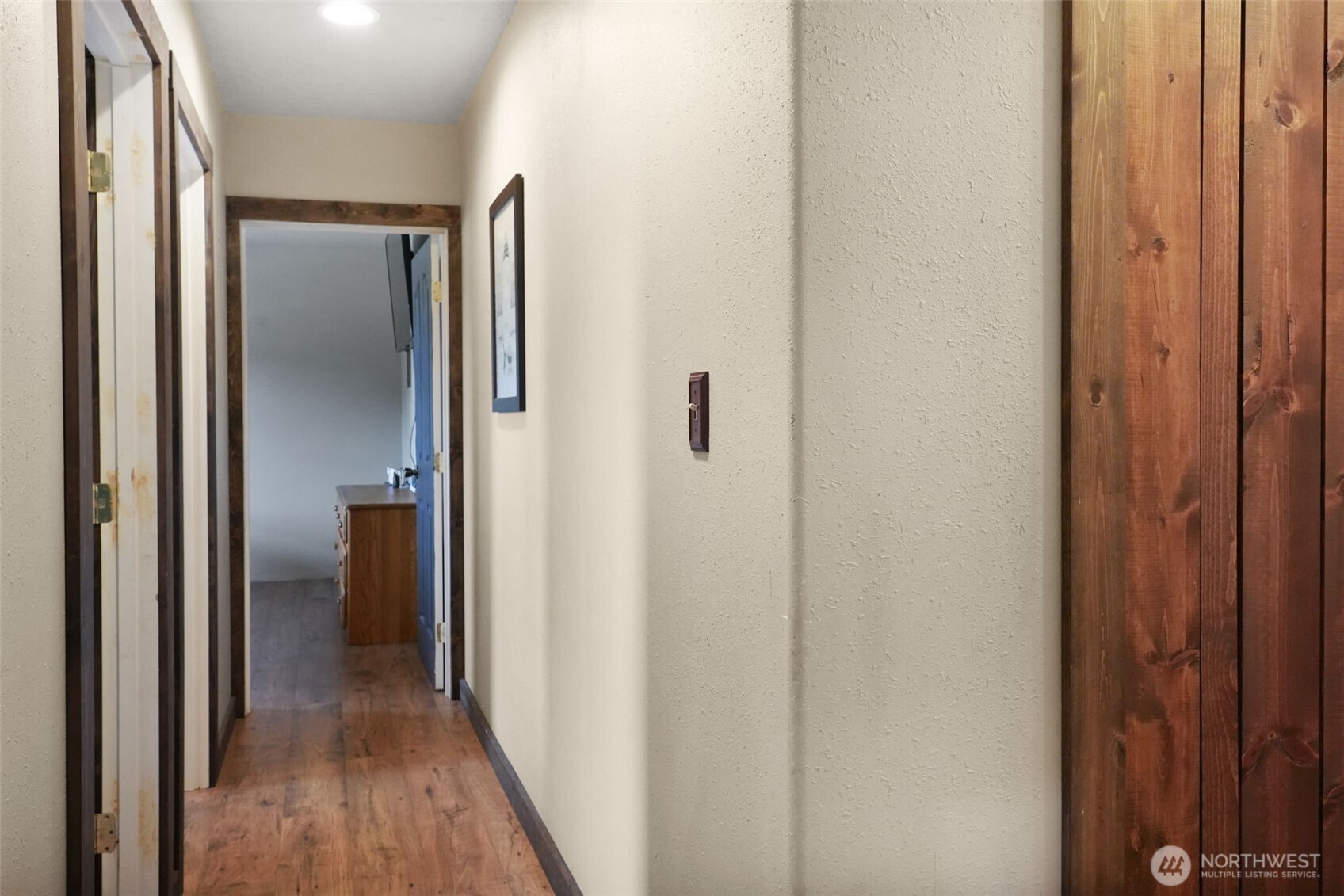 142 Drews Prairie Road Toledo, WA 98591 - Photo 10 of 33 a view of a hallway with wooden floor