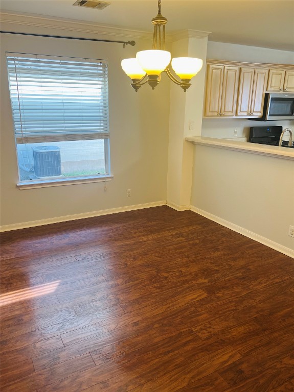 272 Tobin Drive Buda, TX 78610 - Photo 11 of 20 a view of room with window and wooden floor