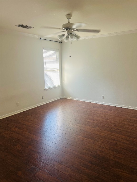 272 Tobin Drive Buda, TX 78610 - Photo 14 of 20 an empty room with wooden floor fan and windows