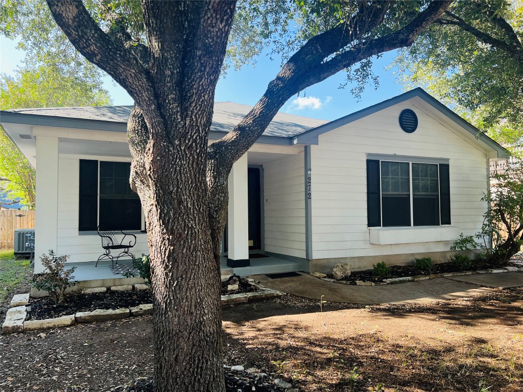 272 Tobin Drive Buda, TX 78610 - Photo 2 of 20 a front view of a house with a yard