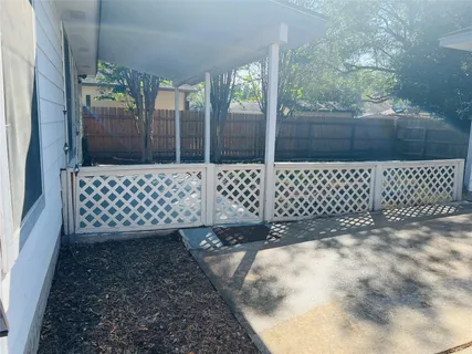 a view of a wooden fence