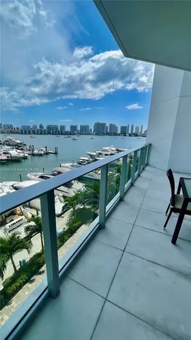 a view of a terrace with yard