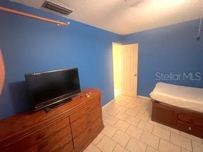 a view of a bathroom from a hallway