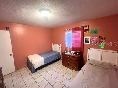 479 Water Road Ocala, FL 34472 - Photo 23 of 31 a bedroom with a bed and window