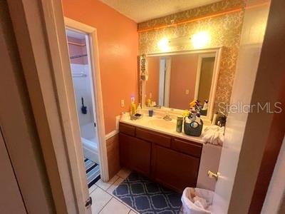 479 Water Road Ocala, FL 34472 - Photo 24 of 31 a bathroom with a sink mirror vanity and toilet
