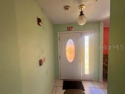 a bathroom with a sink a toilet and a shower