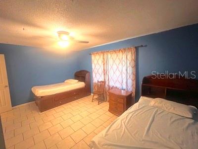 479 Water Road Ocala, FL 34472 - Photo 10 of 31 a bedroom with a bed and a window