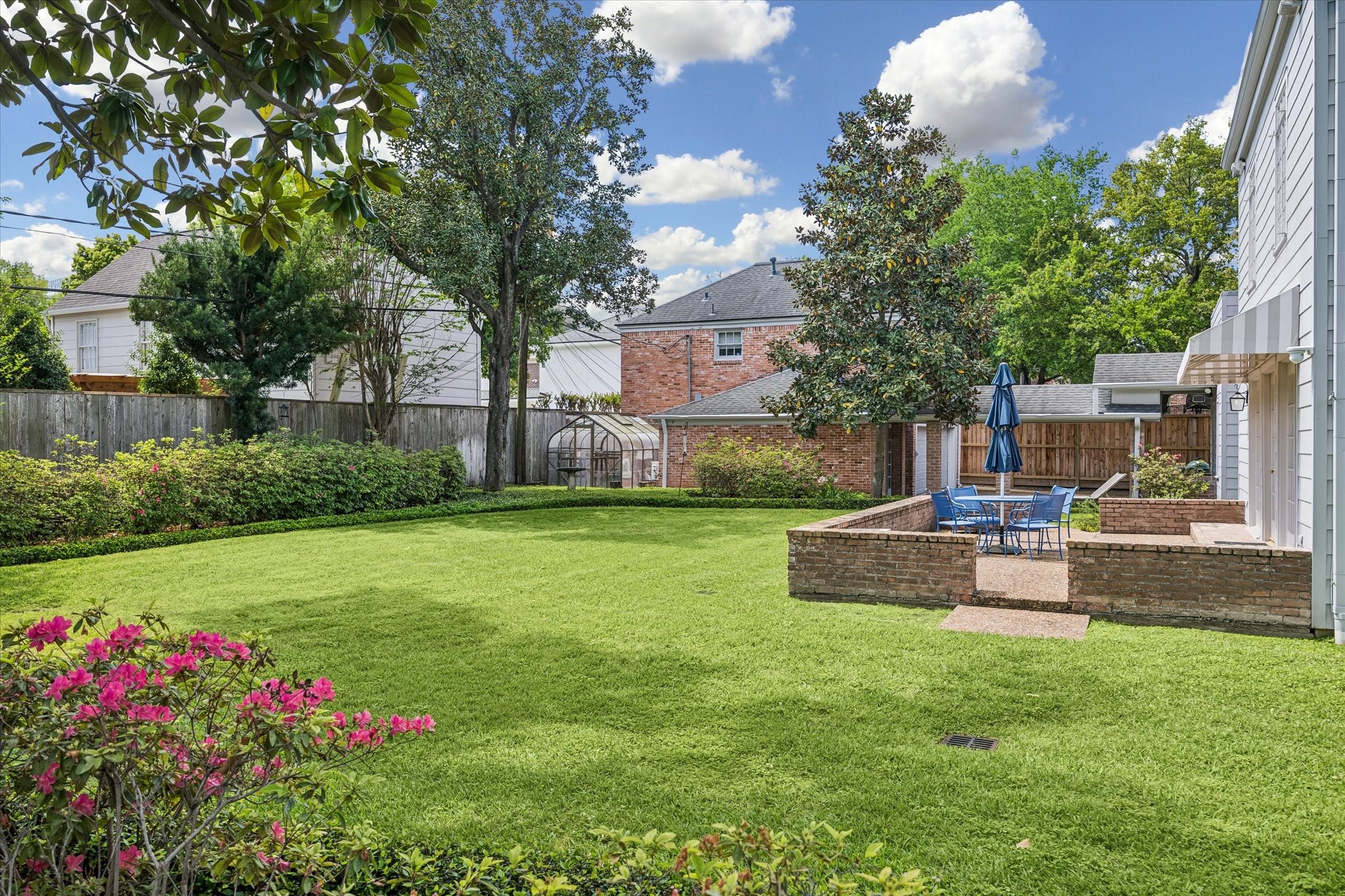 2133 Inwood Drive Houston, TX 77019 - Photo 17 of 22 Thoughtfully arranged outdoor space—ideal as it stands or ready to accommodate a pool or expanded outdoor living.