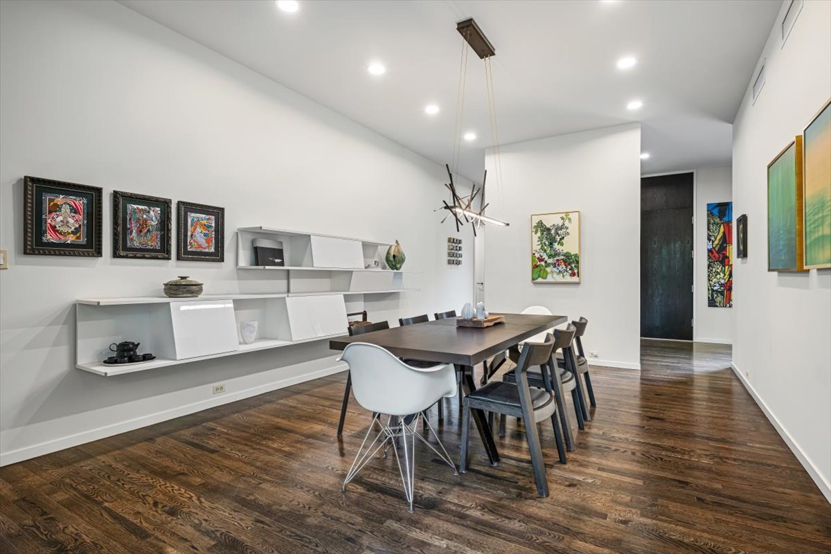 296 White Oak Lane Winnetka, IL 60093 - Photo 12 of 42 a view of a dining room with furniture and wooden floor