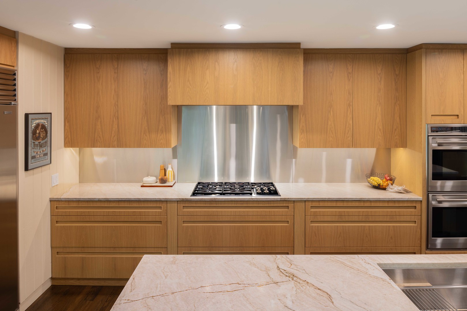 296 White Oak Lane Winnetka, IL 60093 - Photo 15 of 42 a kitchen with stainless steel appliances granite countertop a stove and a refrigerator