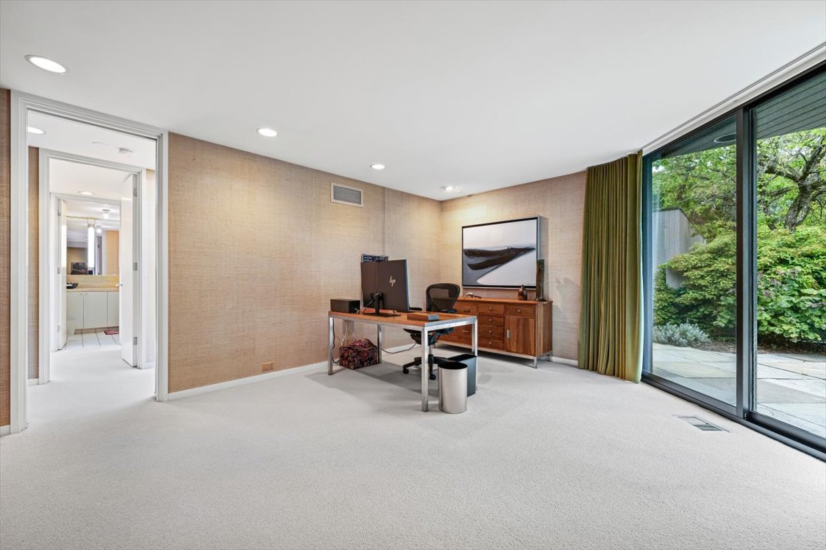 296 White Oak Lane Winnetka, IL 60093 - Photo 25 of 42 a view of a livingroom with workspace and a window