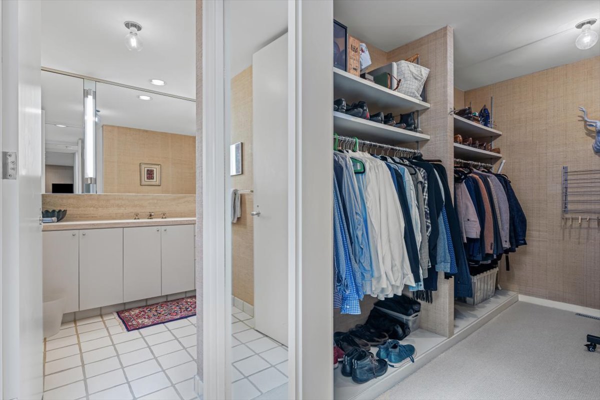 296 White Oak Lane Winnetka, IL 60093 - Photo 26 of 42 a view of walk in closet with clothes and shoes