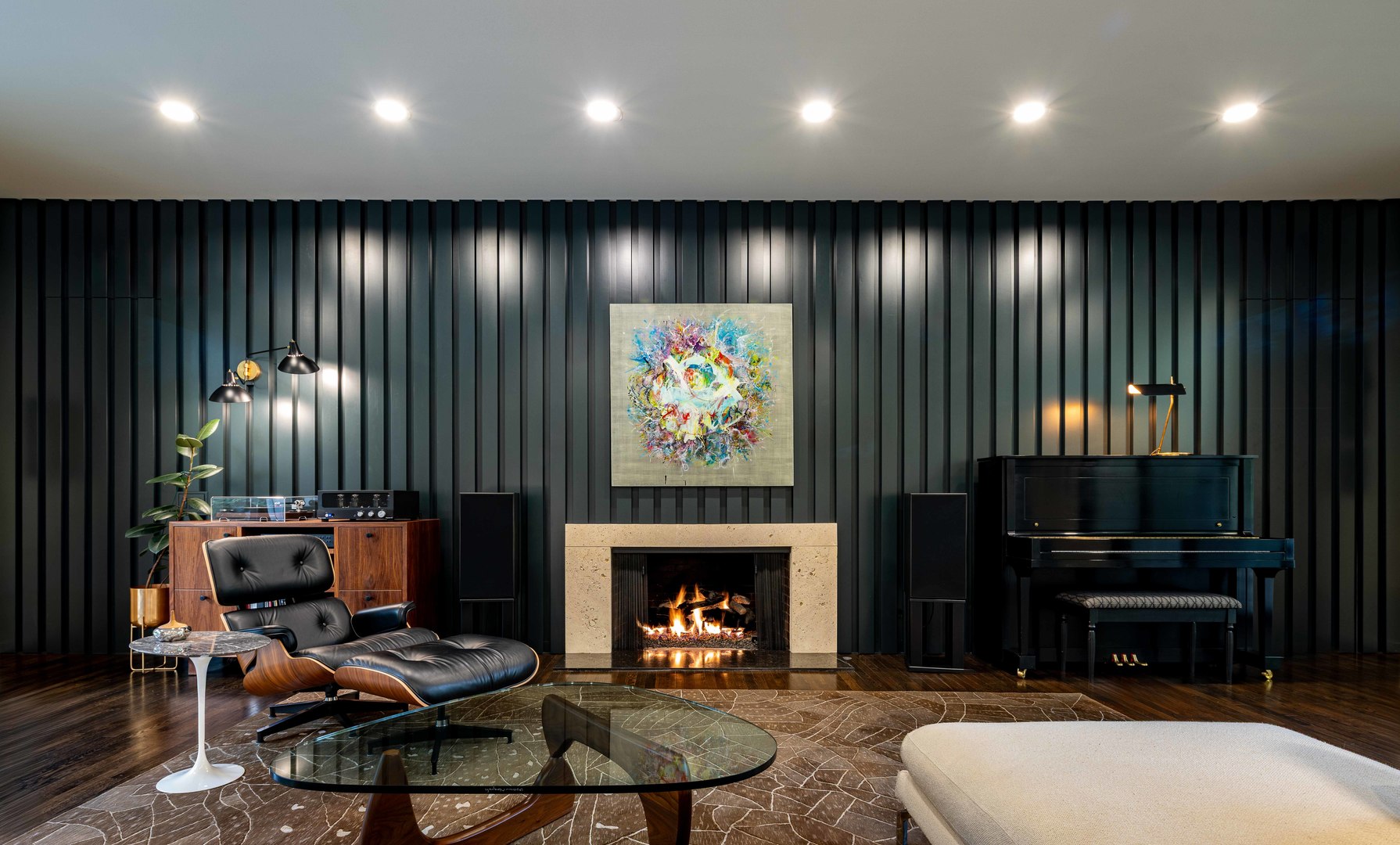 296 White Oak Lane Winnetka, IL 60093 - Photo 9 of 42 a living room with furniture a fireplace and a flat screen tv